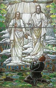 Stained glass depiction of the first vision of Joseph Smith, Jr., completed in 1913 by an unknown artist (Museum of Church History and Art).