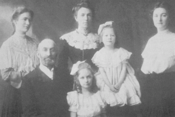 Hebert J. Grant (circa 1900) with his three wives and the first two of what would eventually total twelve children in all. Left to Right: Grace Grant (Evans), Heber J. Grant, Emily Wells Grant, Frances Grant (Bennett), Emily Grant (Mansen), Deseret